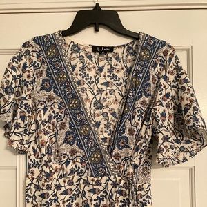 Lulu’s wrap dress. Very light weight and great for summer days!